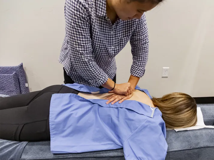 Chiropractor American Fork UT Debbie Pun Adjusting Patient